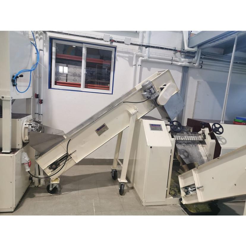 Soap mass from the Mixer or Refiner is fed into the Triple Roll Mill. It passes through three precision rollers rotating at different speeds.